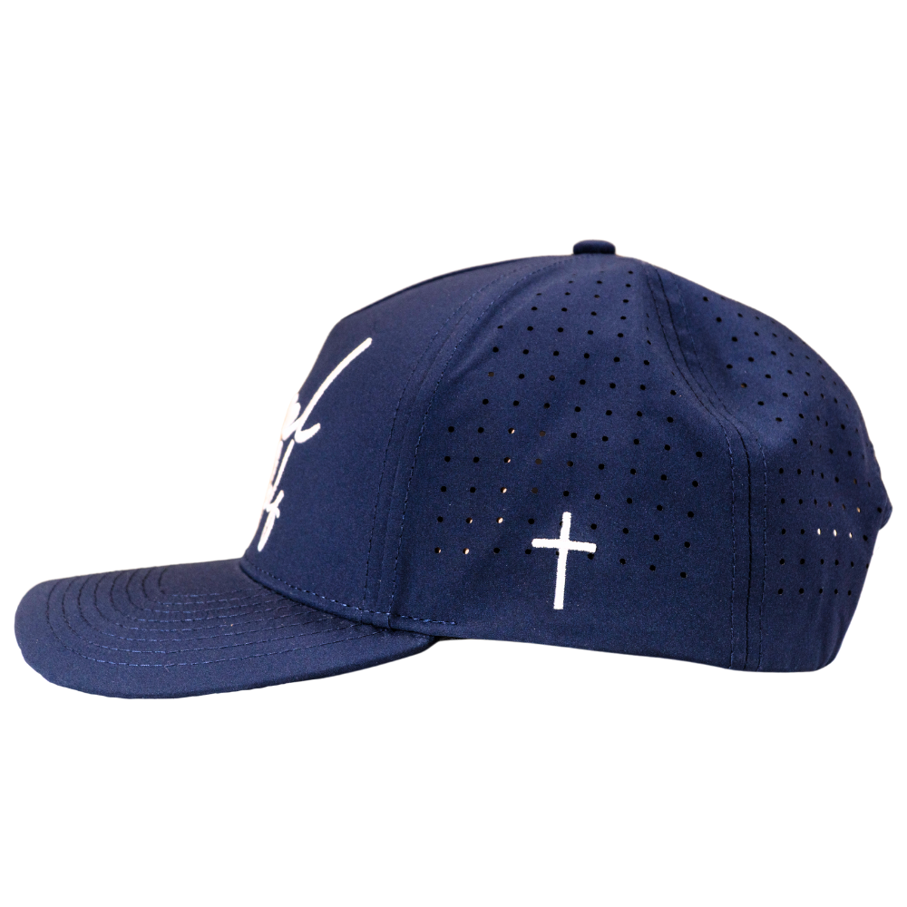 Gospel Golf Cursive Navy Hat - ApparelGospel Golf Hat, designed for those who value simplicity and elegance. This snapback hat features an embroidered cursive Gospel Golf text.