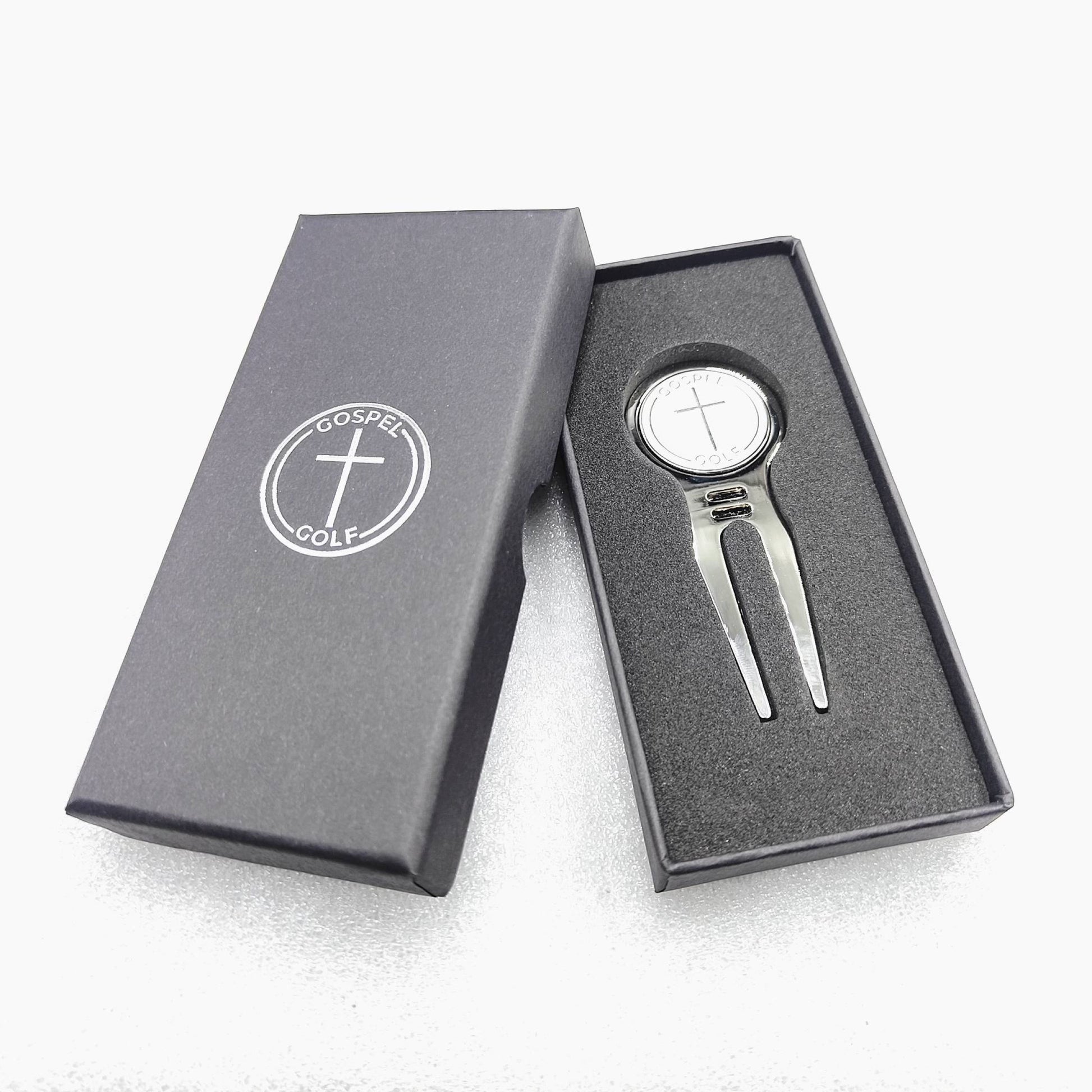 Gospel Golf Divot Tool + Ball MarkerGospel Golf Custom Divot Tool. Meticulously crafted with a custom mold design, this divot tool has premium features that make it a must-have accessory.